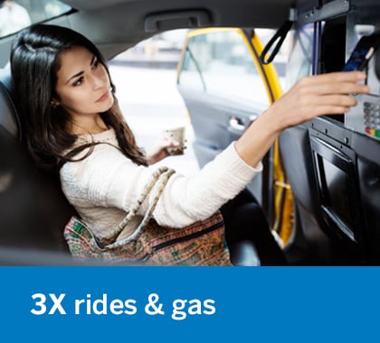 Businesswoman entering a taxi cab